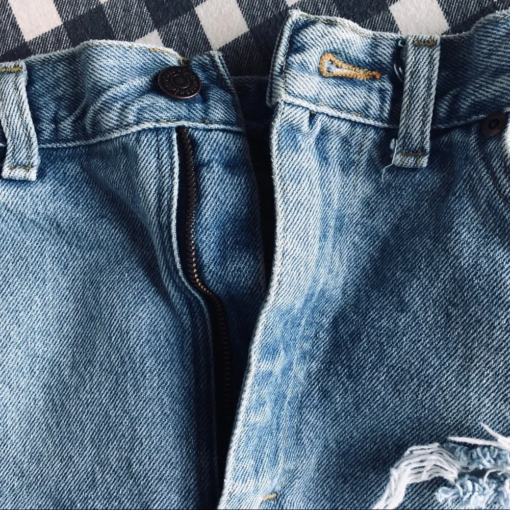 Lee Hand-made distressed denim shorts